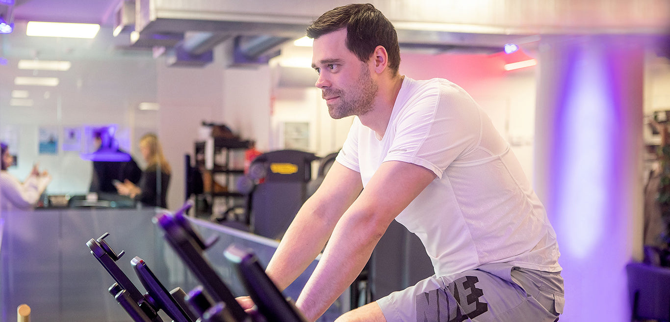 Man biking indoors