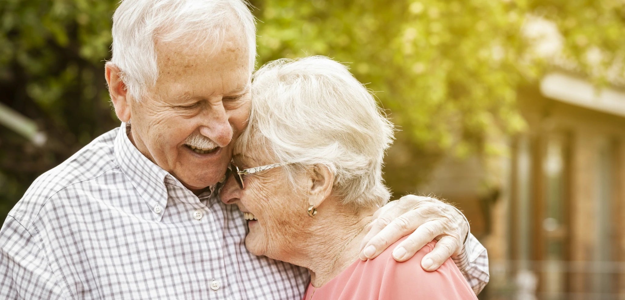 Elderly couple laughing